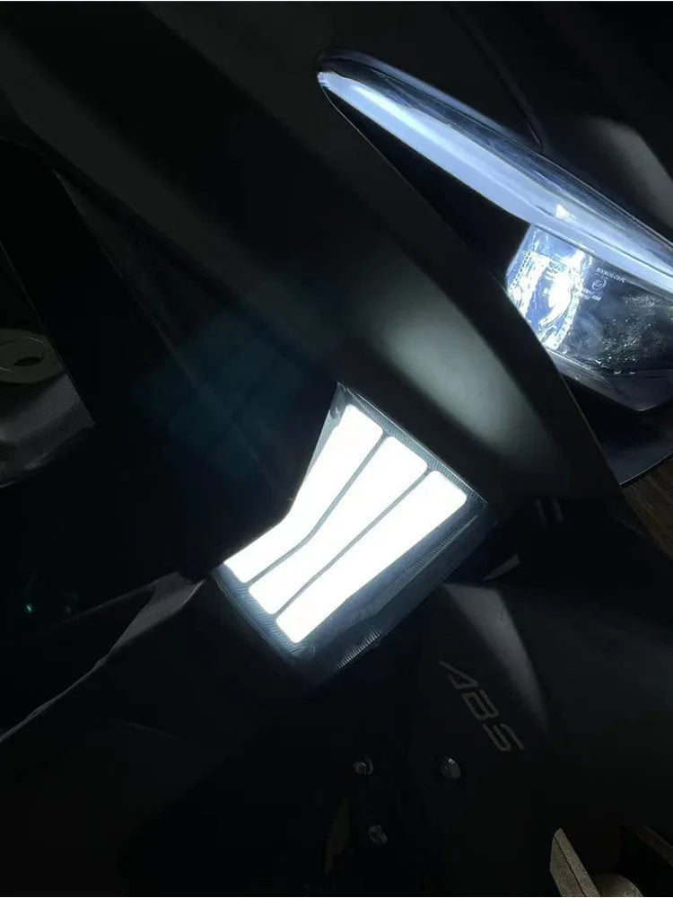 Two yellow LED cornering lamps for Tianying TS150 motorcycle on a white background.