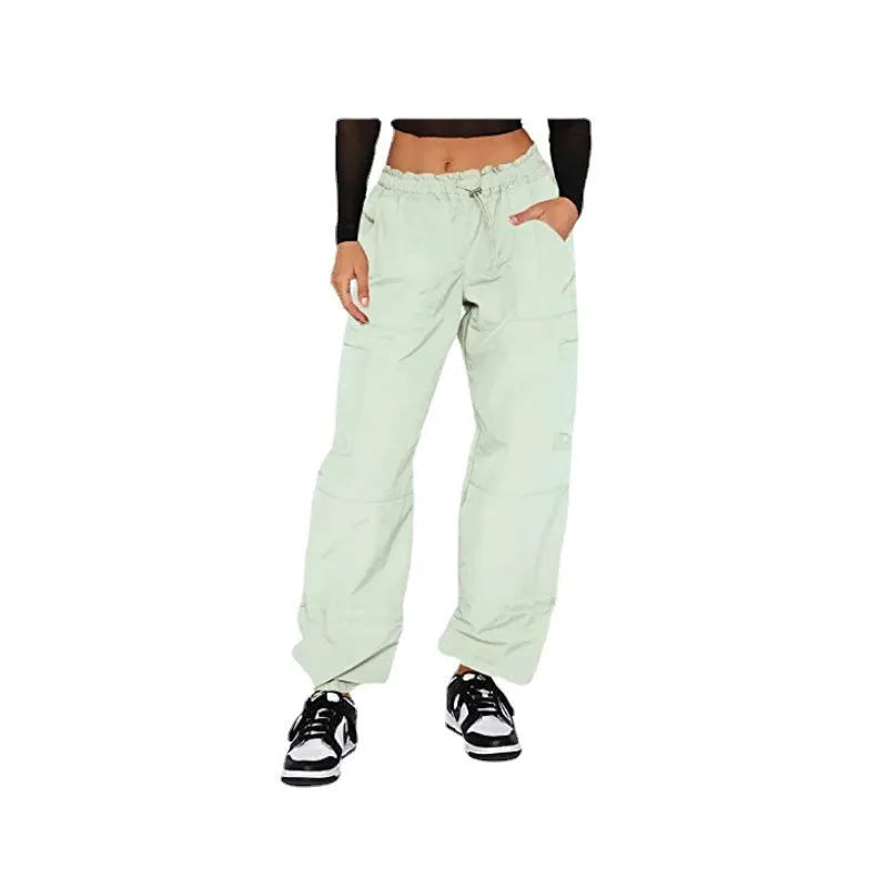 Straight leg multi-pocket cargo trousers in polyester fabric, shown in a neutral colour with visible cargo pockets.