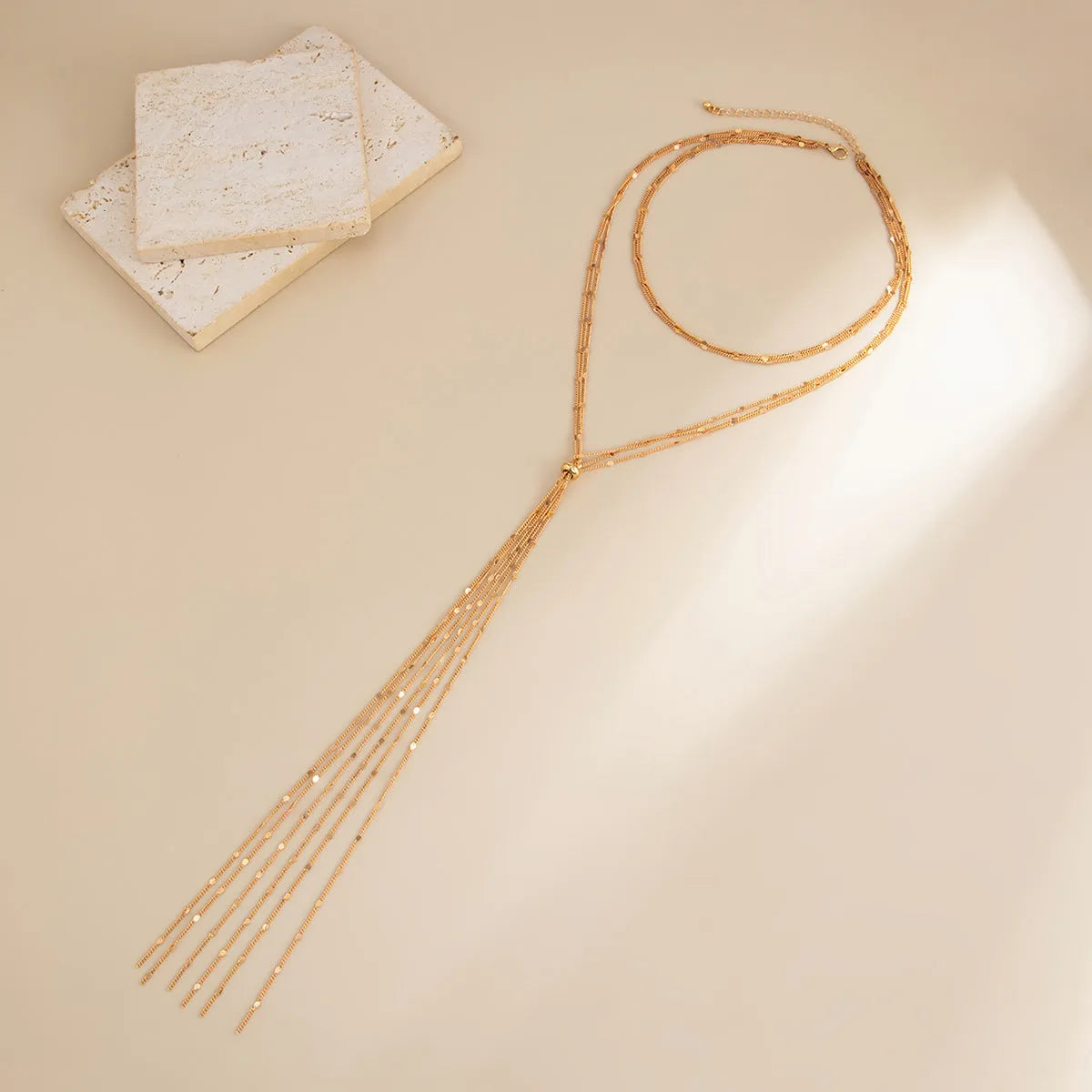 Women's multi-layer Y-shaped tassel neck back chain in gold copper electroplated finish, adjustable 35-57cm circumference
