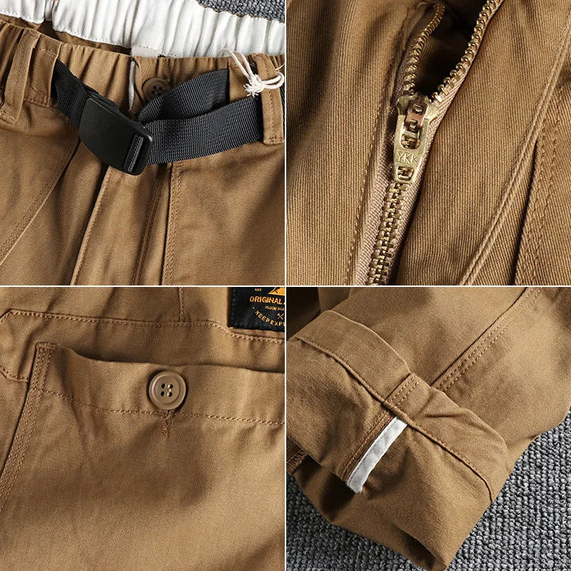 Man's khaki cotton canvas work trousers with 3D cut, showing mid-rise waist and zipper fly.