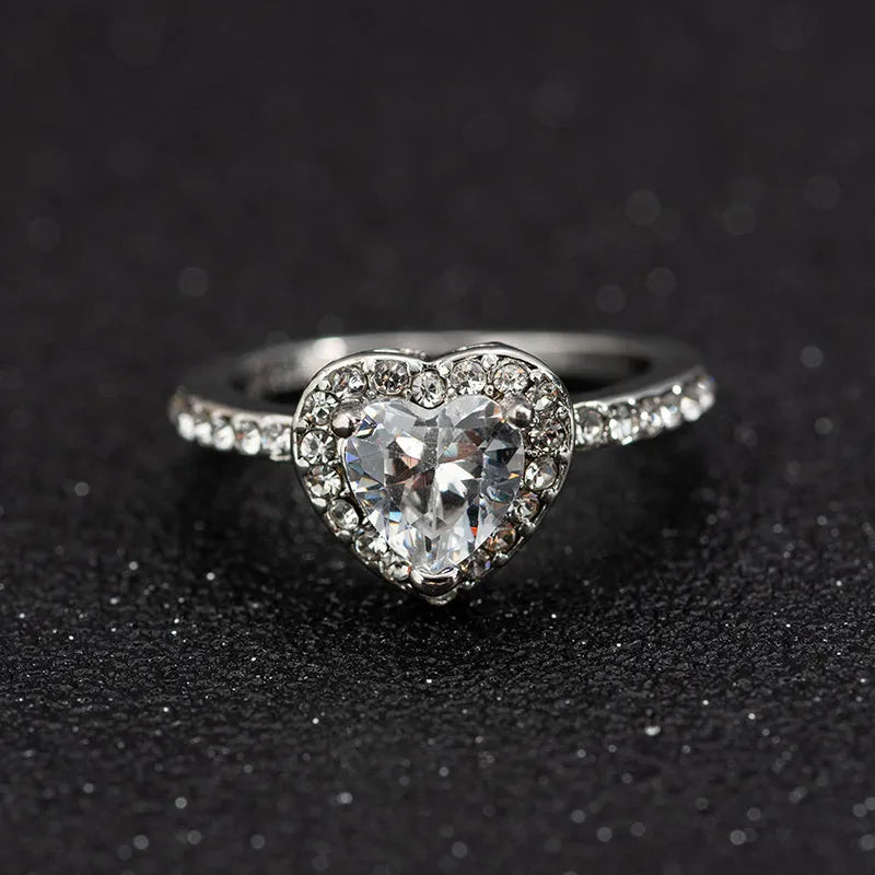 Women's heart-shaped crystal wedding ring with electroplated rose gold finish on white copper