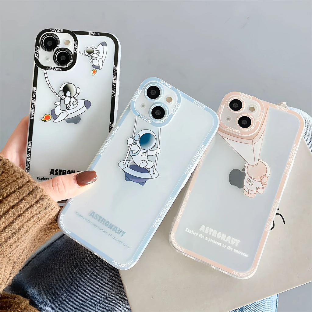 Transparent iPhone case with blue astronaut print showing phone through clear silicone and TPU material