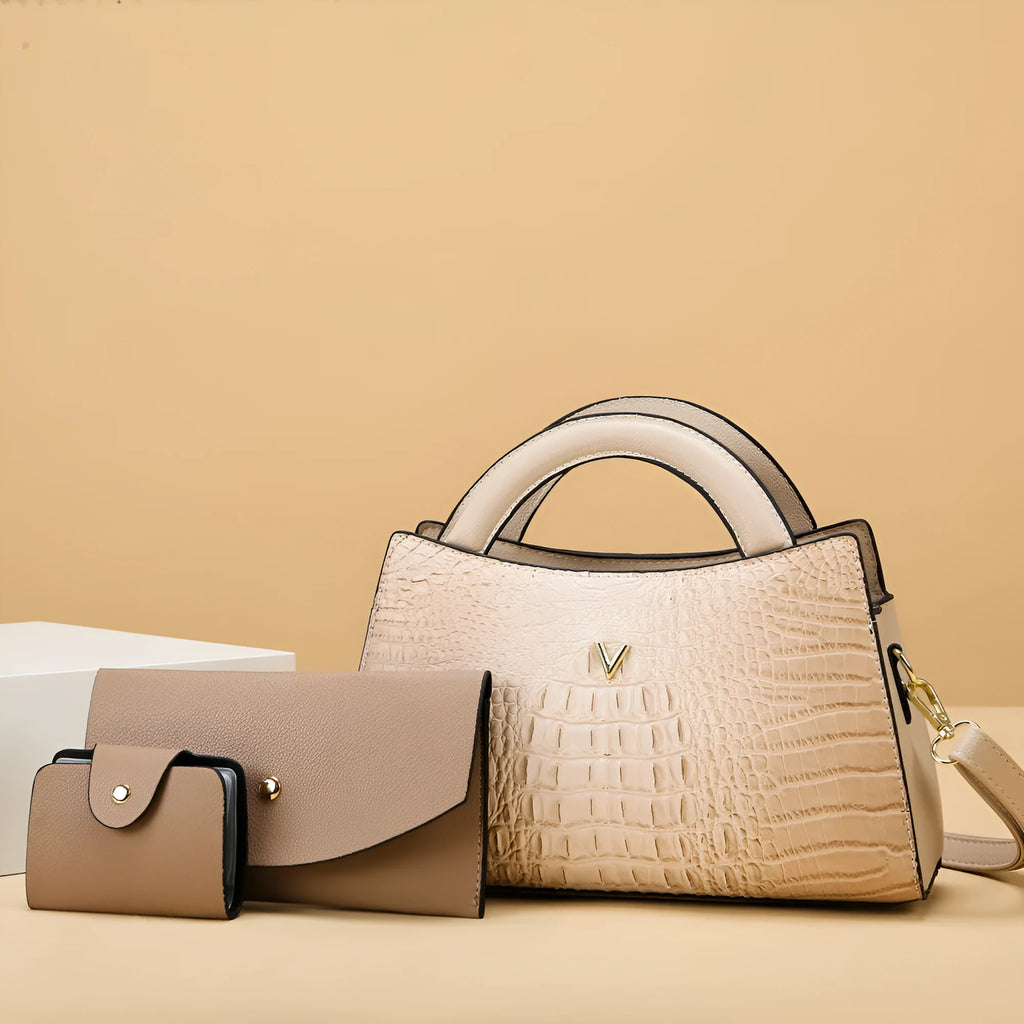 Women's square black crocodile pattern PU leather crossbody handbag with a single strap and outer pockets.