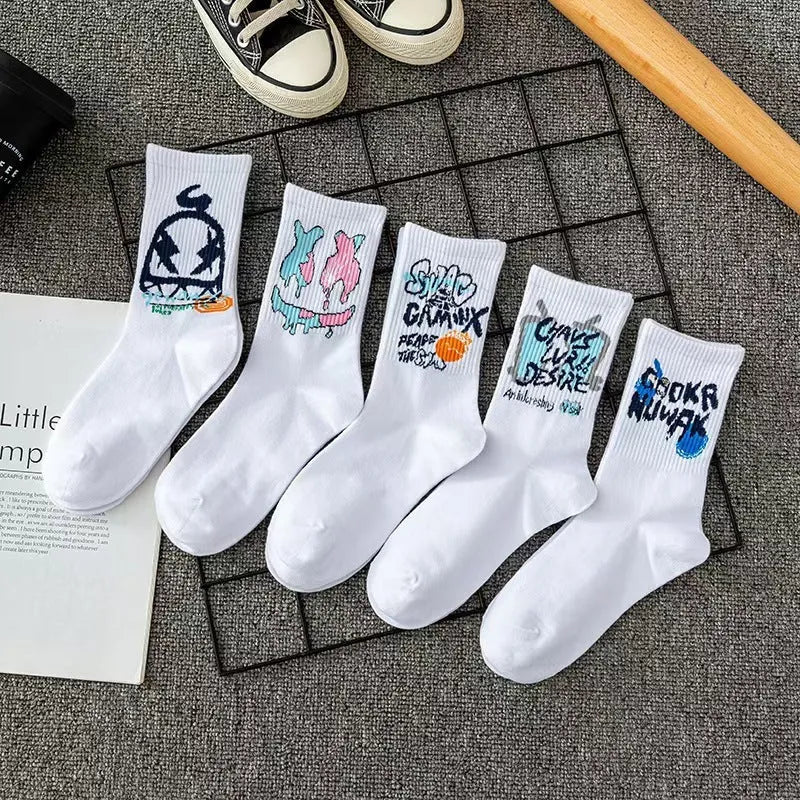 10 pairs of white cotton tube socks with graffiti pattern, middle calf length, on a plain background