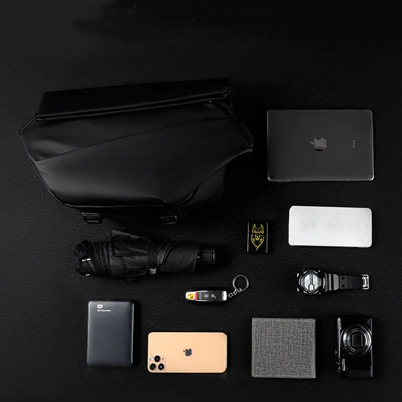 Grey PU leather crossbody sling backpack for men showing horizontal square shape and shoulder strap