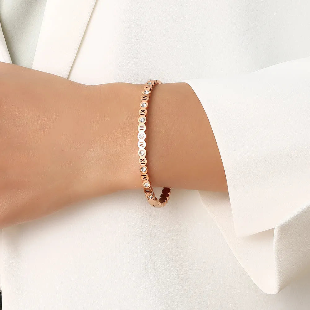 Korean style titanium steel bracelet with number charm in gold, rose gold or steel colour