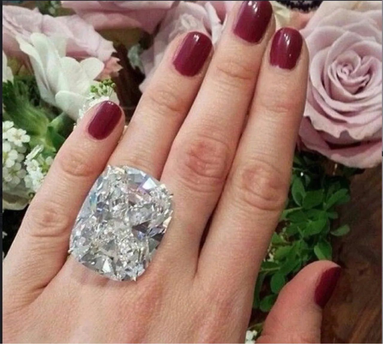 Simple geometric women's alloy ring with square detailing in white gold colour finish.