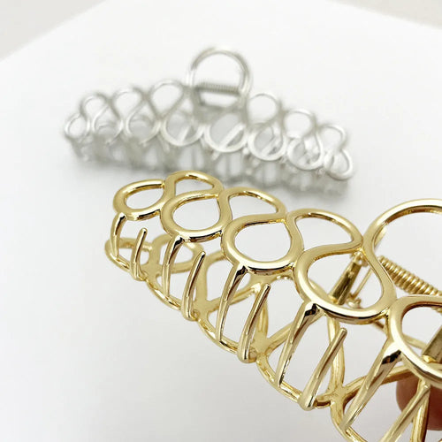 Gold and silver alloy hair clip with tassel detail for updo hairstyles