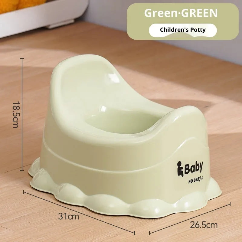 Children's small portable thickened toilet in Green with lid on white background