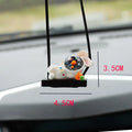 Cartoon astronaut resin pendant for car decoration, shown in various colour and style options.
