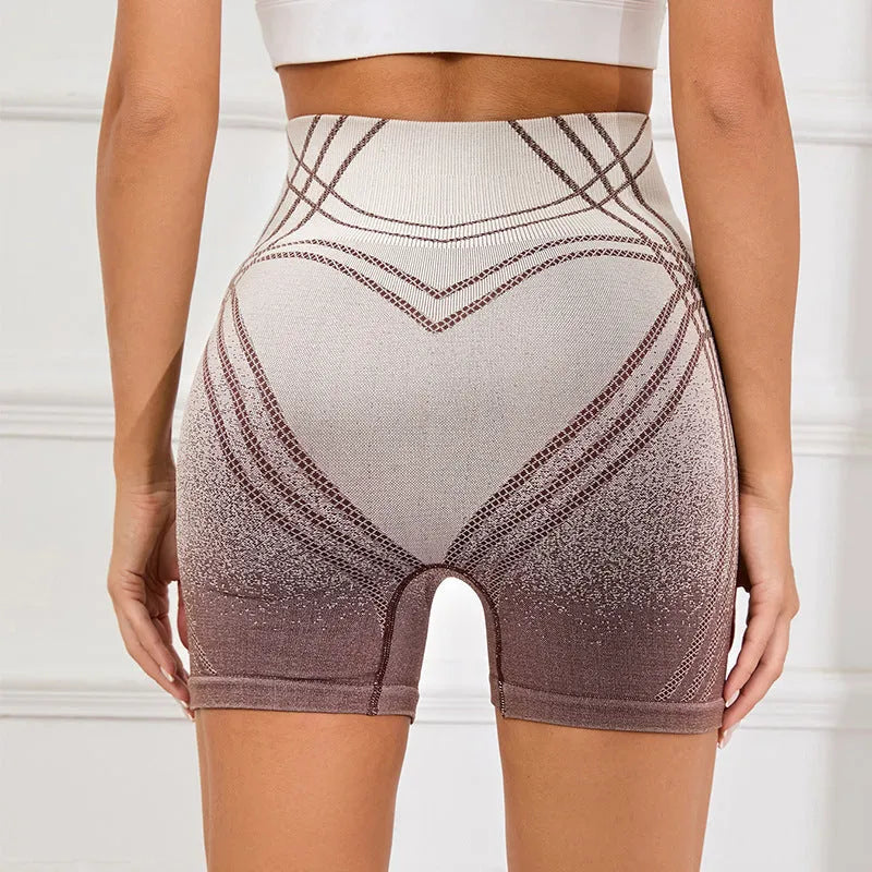 Brown and black gradient high waisted fitness shorts for women on a mannequin.
