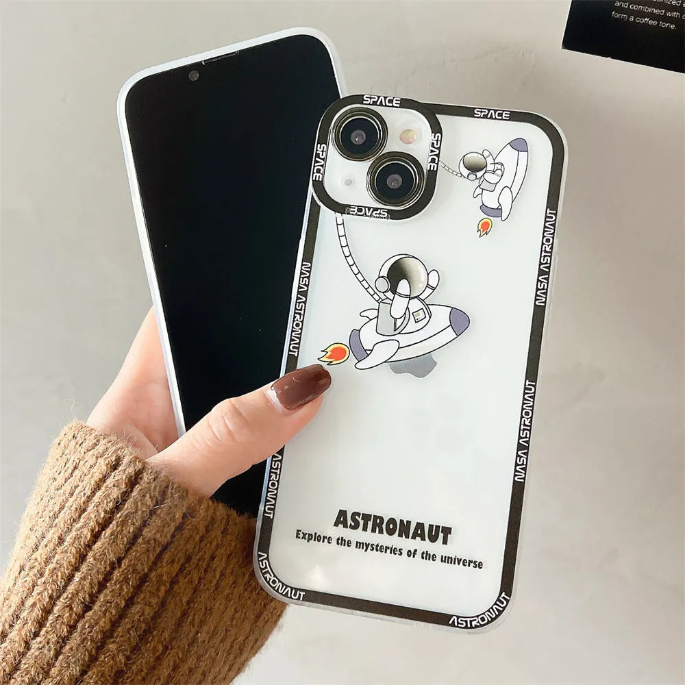 Transparent iPhone case with blue astronaut print showing phone through clear silicone and TPU material