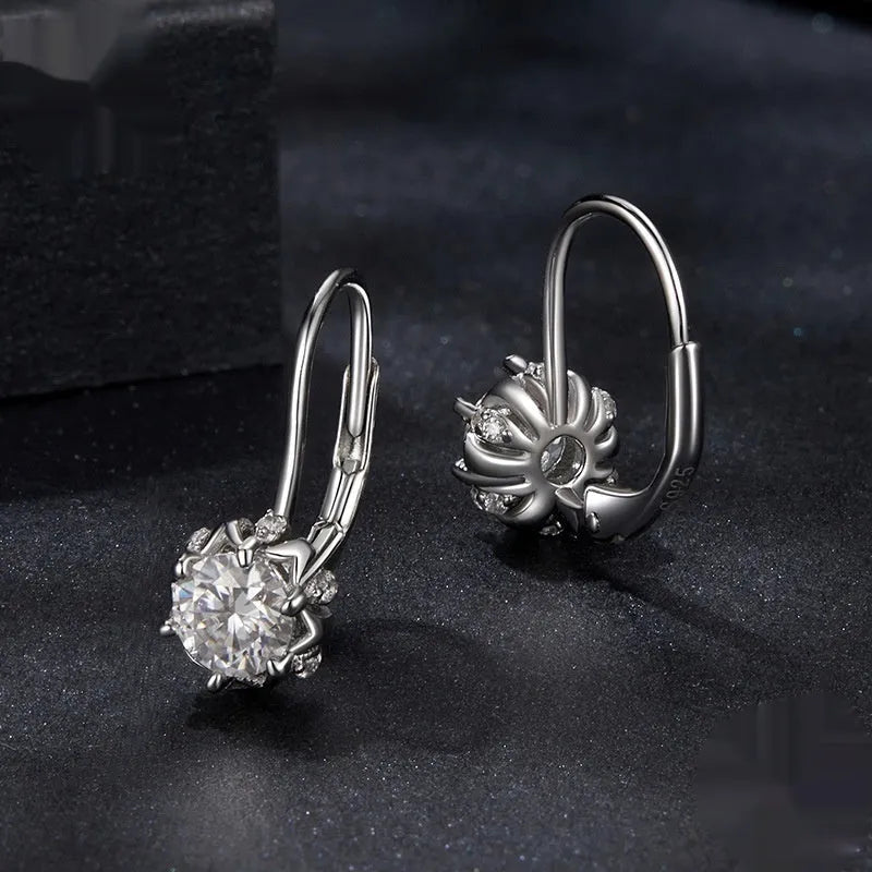 Sterling silver flower bud ear clips with moissanite centre stones and white gold plating