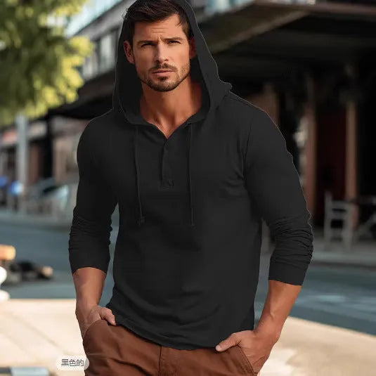 Cotton pullover sports hoodie in apricot colour on a hanger.