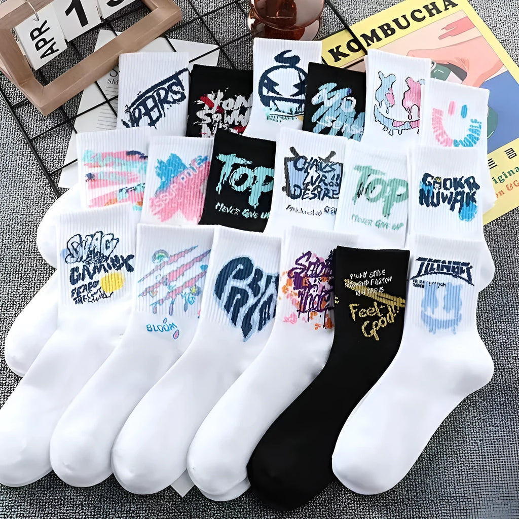 10 pairs of white cotton tube socks with graffiti pattern, middle calf length, on a plain background