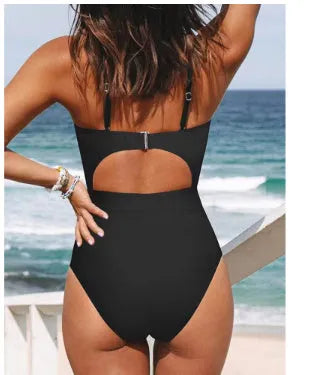 Women's solid colour backless one-piece swimsuit in polyester fabric.