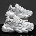 Men's PU running sports shoes in beige with stitching detail, side view