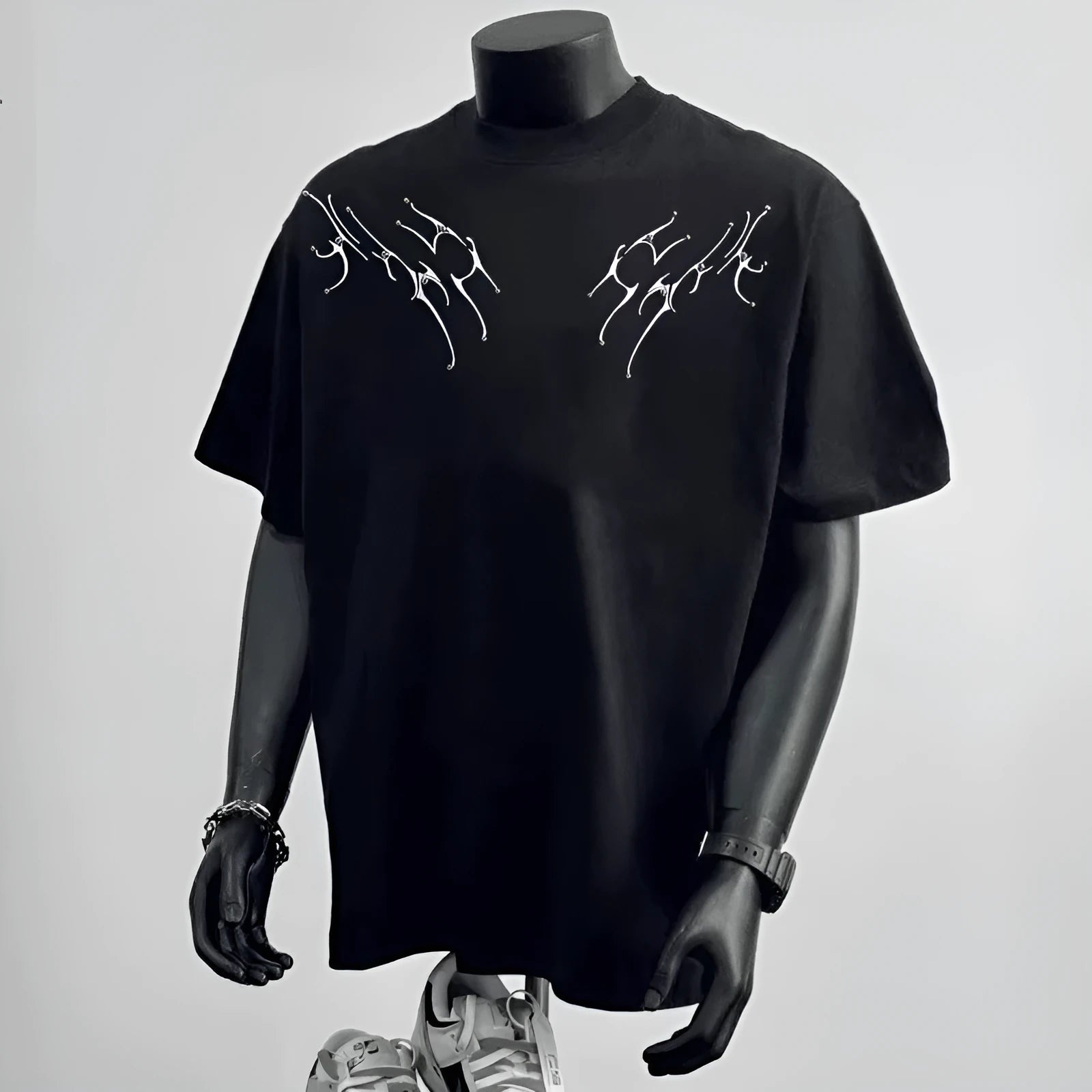 Men's black and white loose-fit pure cotton short sleeve casual shirt on a hanger.