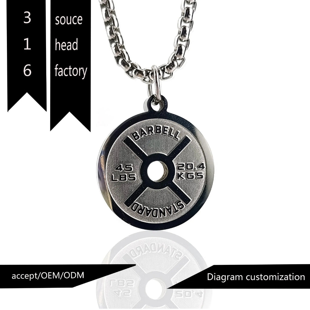 Polished stainless steel barbell disk pendant on a 60cm chain, a fitness-inspired geometric necklace.