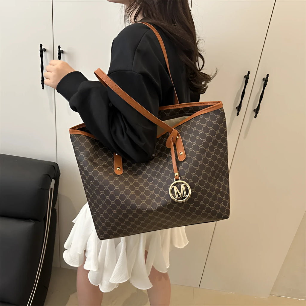 Women's structured PU leather shoulder bag with street trend sewing details shown in neutral colour options
