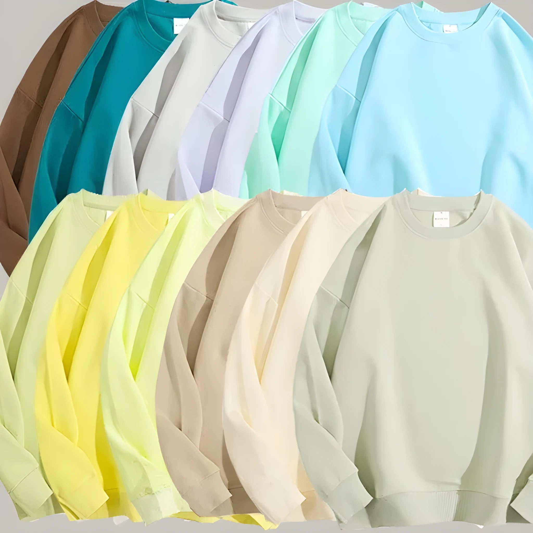 Cotton off shoulder loose pullover sweater in a solid colour with round neck and long sleeves.