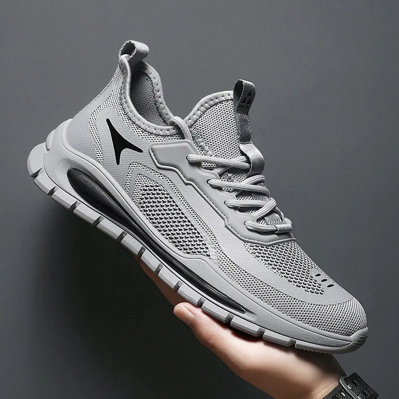 Mens breathable woven mesh low top lace up sports shoes in black and gray with PVC sole