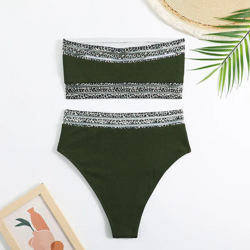 Black strapless leopard print bikini set with separate bra and shorts on a neutral background.