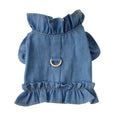 Blue denim dog dress with a ruffled vest design and a metal leash hook on the chest.