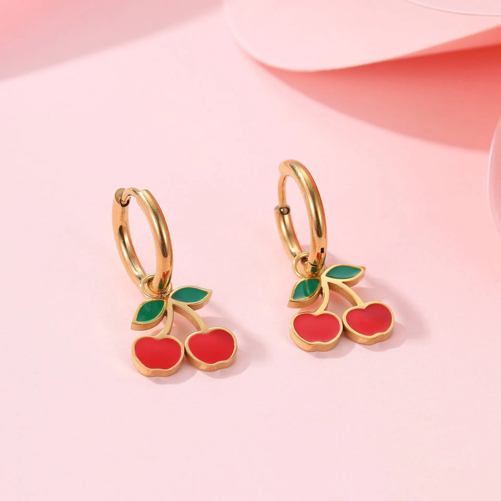 Stainless steel cherry jewellery set with necklace, bracelet, earrings, and ring in golden electroplated finish