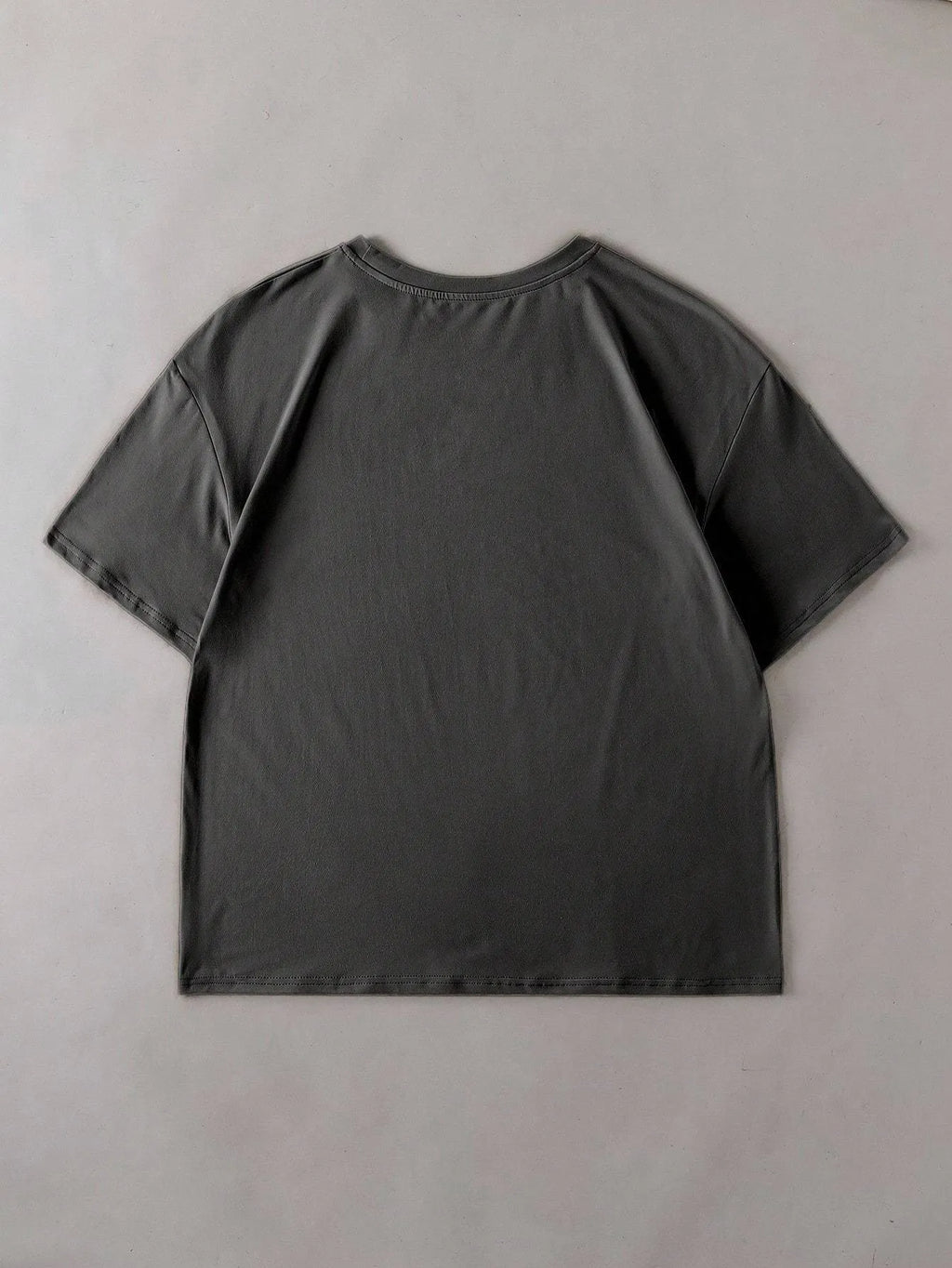 A man or woman wearing a casual cotton summer t-shirt with short sleeves and a round neck.