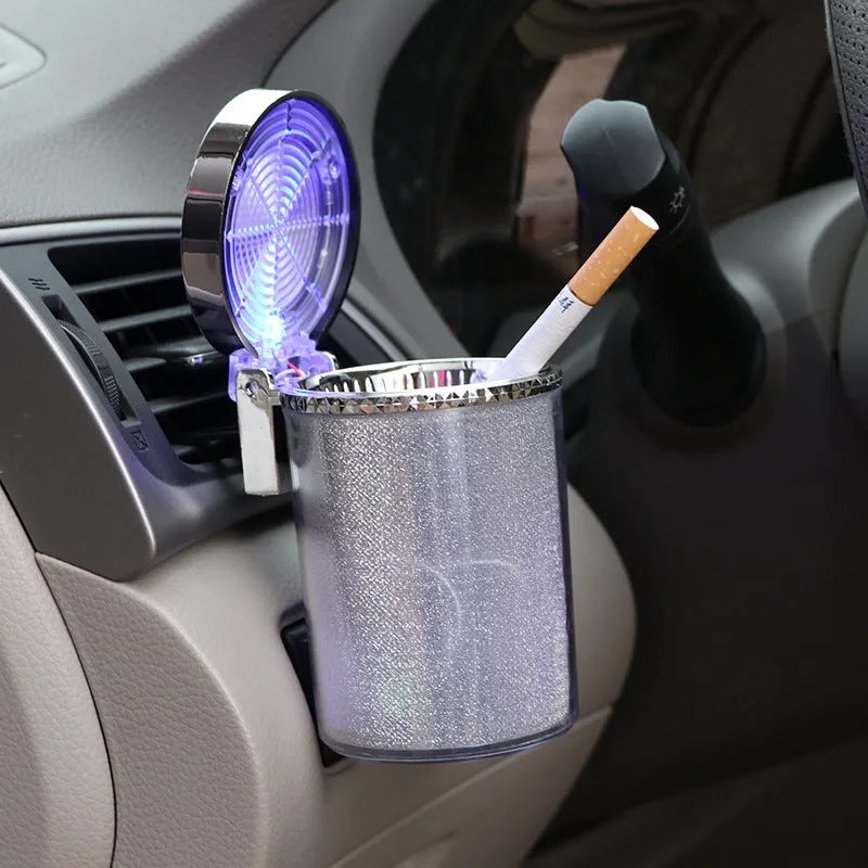 Silver ABS car ashtray with RGB LED lights, lid closed, compact 10x8x6cm