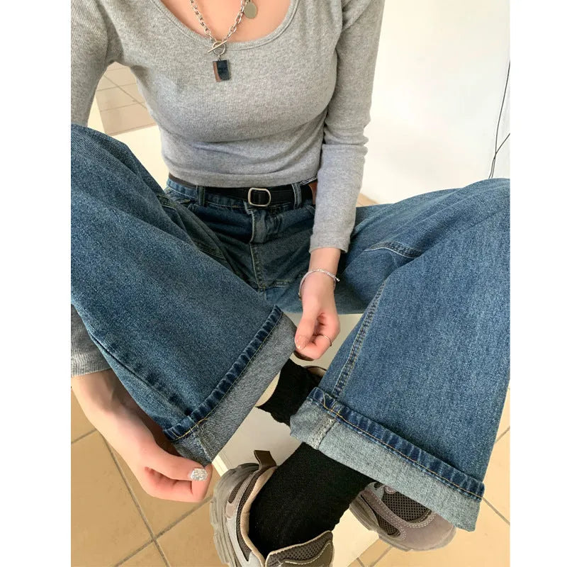 Women's high-waisted straight-leg jeans in retro blue cotton denim showing front view