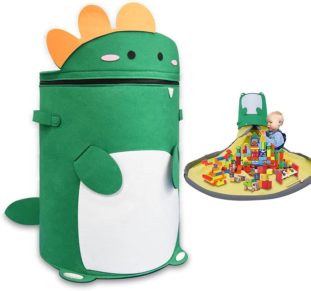 Green felt cube storage bag with pull rope open as a floor play mat for toys.