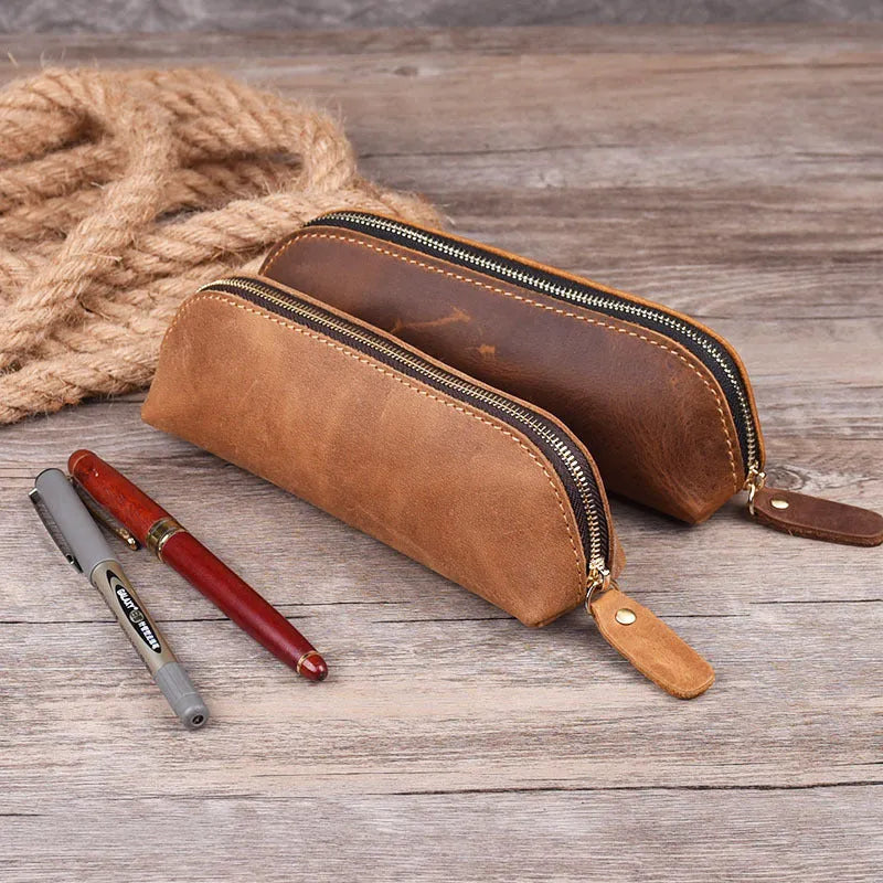 Black handmade cowhide leather pencil case with zipper, showing square 18cm design.