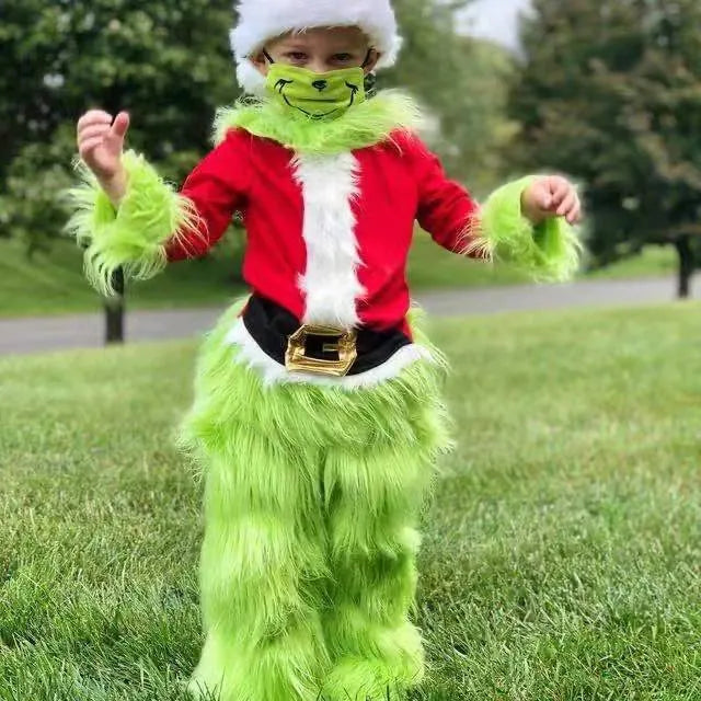 Children's green cotton Halloween costume set with top and pants on display