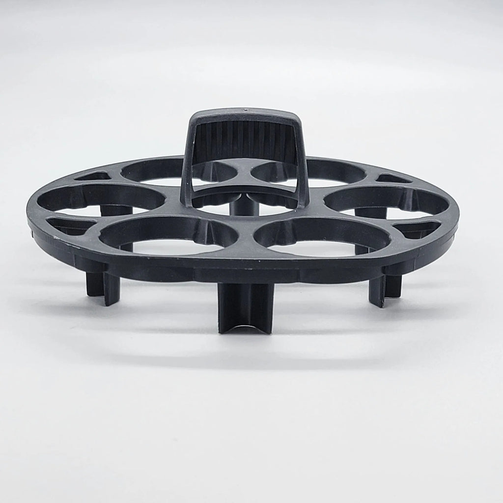 Black plastic egg cooking basket with modern design, shown with dimensions 13.8cm by 12.6cm by 5.7cm.