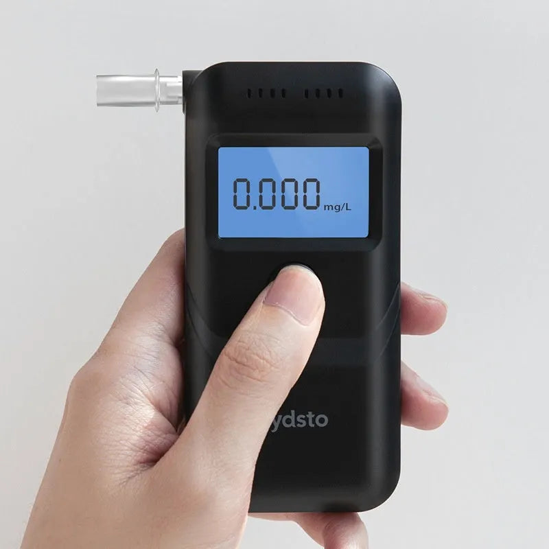 Black household alcohol tester breathalyzer device for drunk driving detection