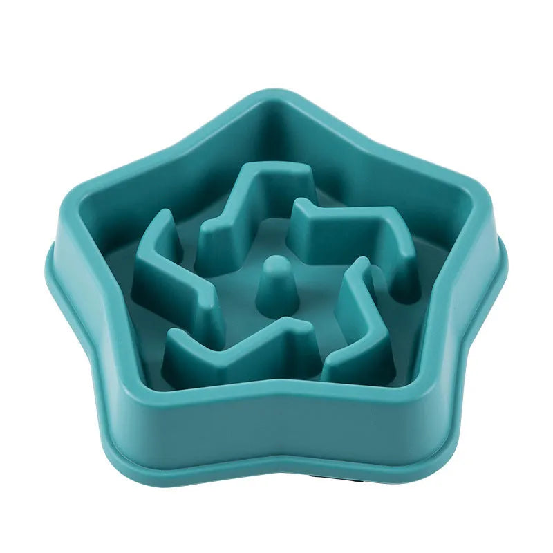 Yellow plastic dog slow feeder bowl with textured bottom and interior feeding obstacles