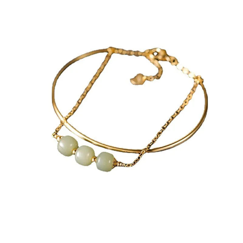 Women's jade lucky beads bracelet with gold inlay decoration in single, double and three beads versions