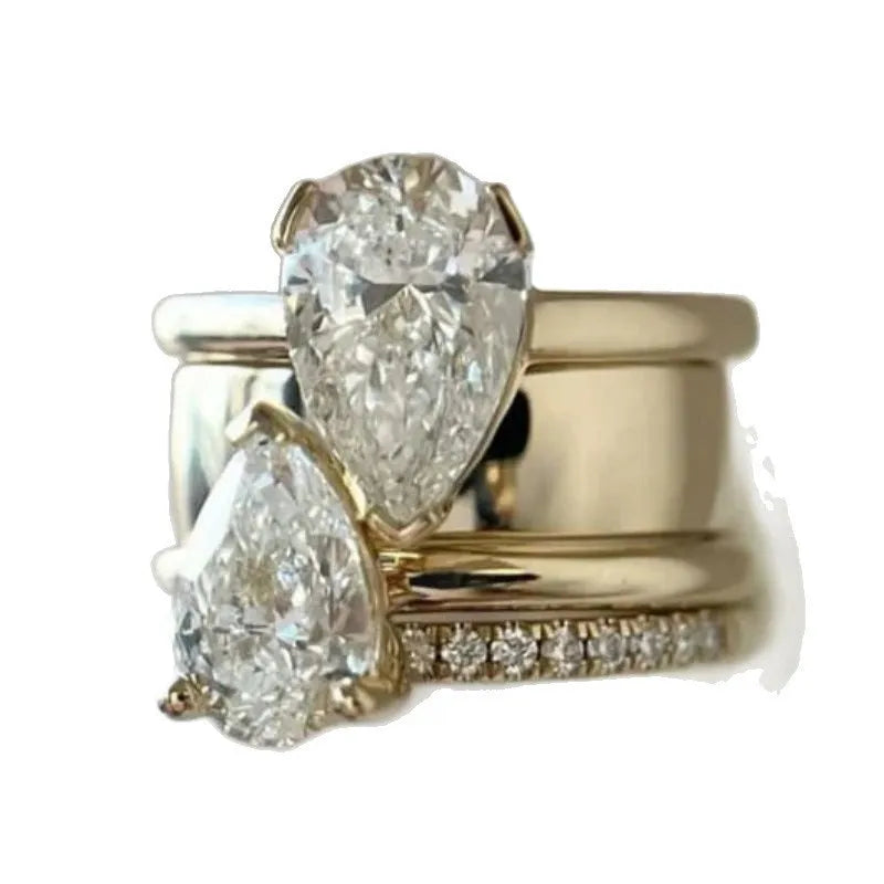 Fashion micro inlaid zircon ring in gold colour with drop-shaped stone, brass material, US size 7