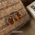 Handmade alloy earrings set showing three geometric designs: irregular amber, wafer disc and water drop tigereye styles