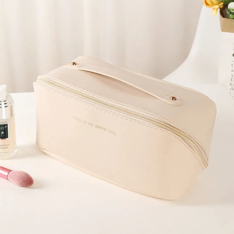 Korean style PVC waterproof pillow cosmetic bag in milky white with letter print pattern
