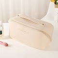 Korean style PVC waterproof pillow cosmetic bag in milky white with letter print pattern