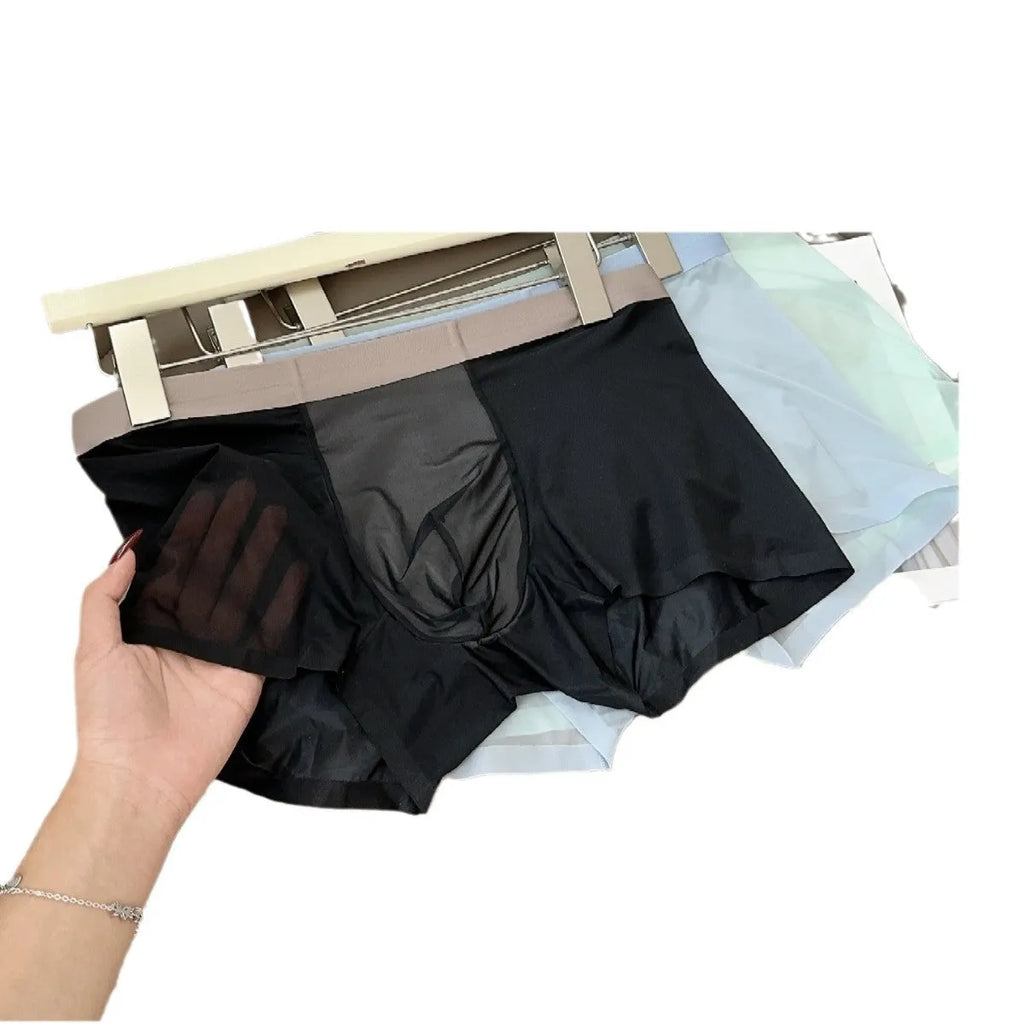 Seamless ultra-thin men's boxers in Ice Silk fabric with a honeycomb crotch, shown in a neutral colour.