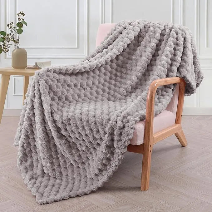 Children's soft plaid polyester blanket in camel colour, shown in a 90x90 inch size.