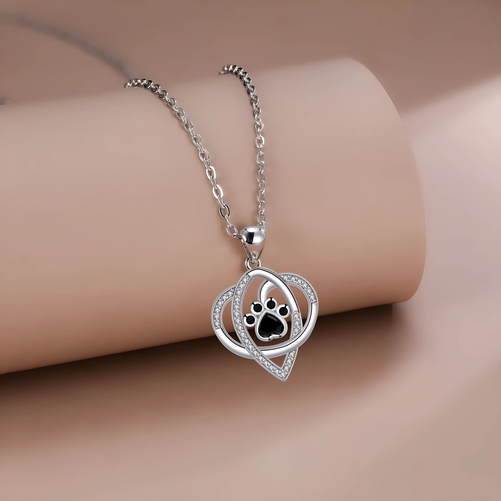 Women's necklace with dog paw print pendant on cross chain, electroplated copper finish
