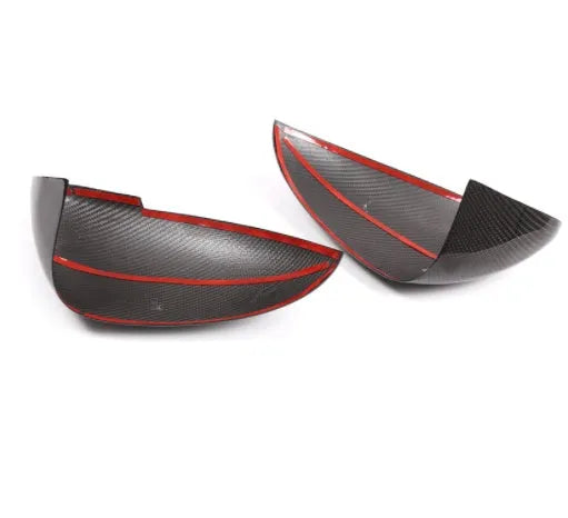 Pair of black true carbon fibre rearview mirror covers for a Porsche Macan.