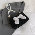 Women's casual canvas handbag with single shoulder strap in black, white, or pink colours showing sandwich pocket design