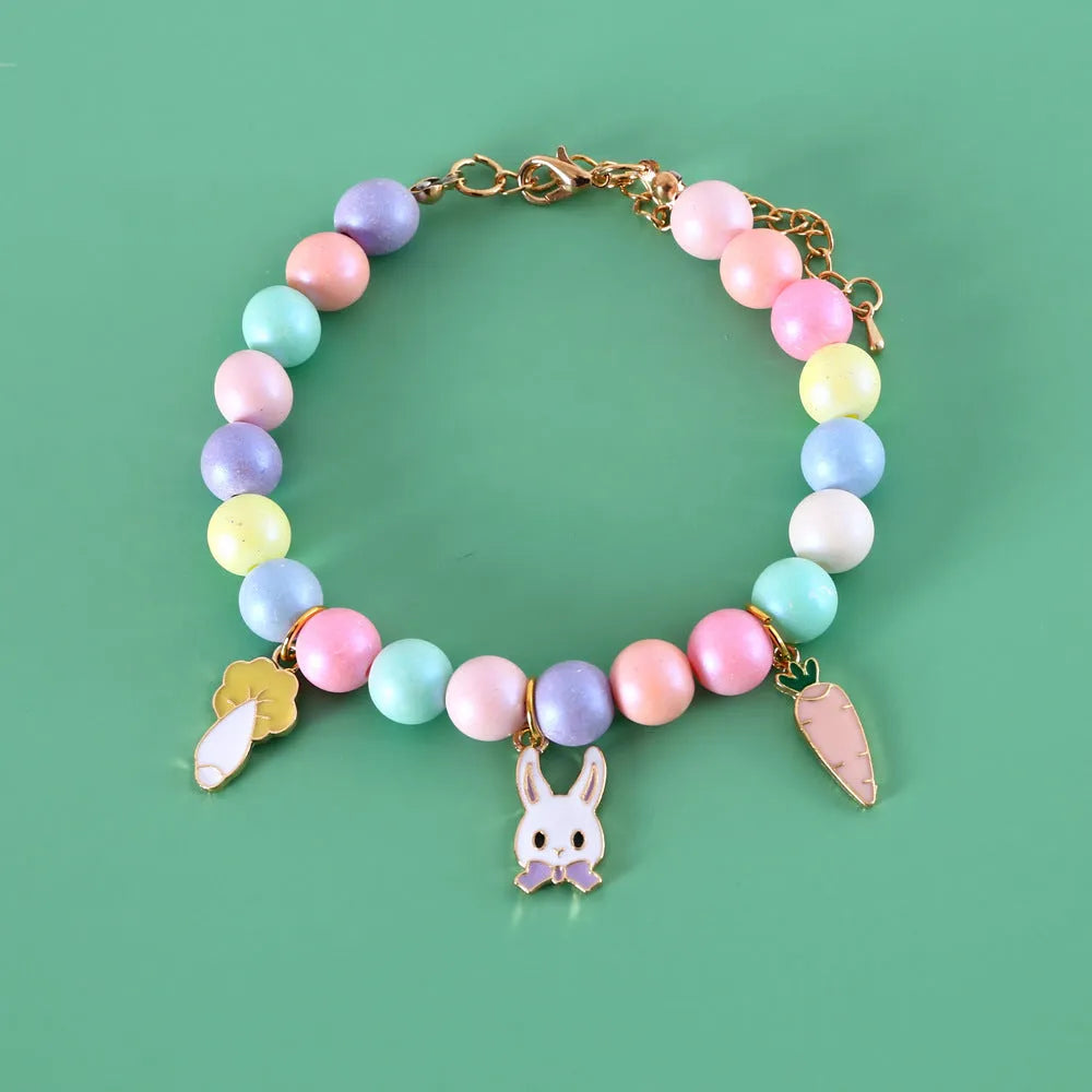Macaron-themed pet collar accessories in resin with adjustable sizing options