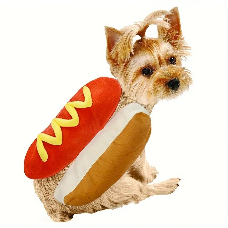 Small dog wearing a red and brown full-body hot dog costume with a bun-shaped hood.